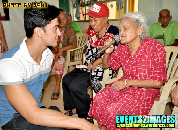 June listens while one of the Lola's rendered a very touching song for him..